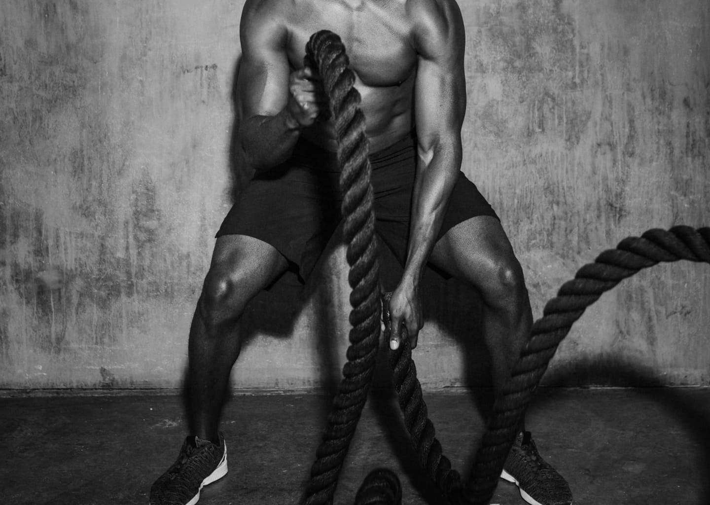 muscular-man-doing-battle-rope-gym-3-bg.jpg